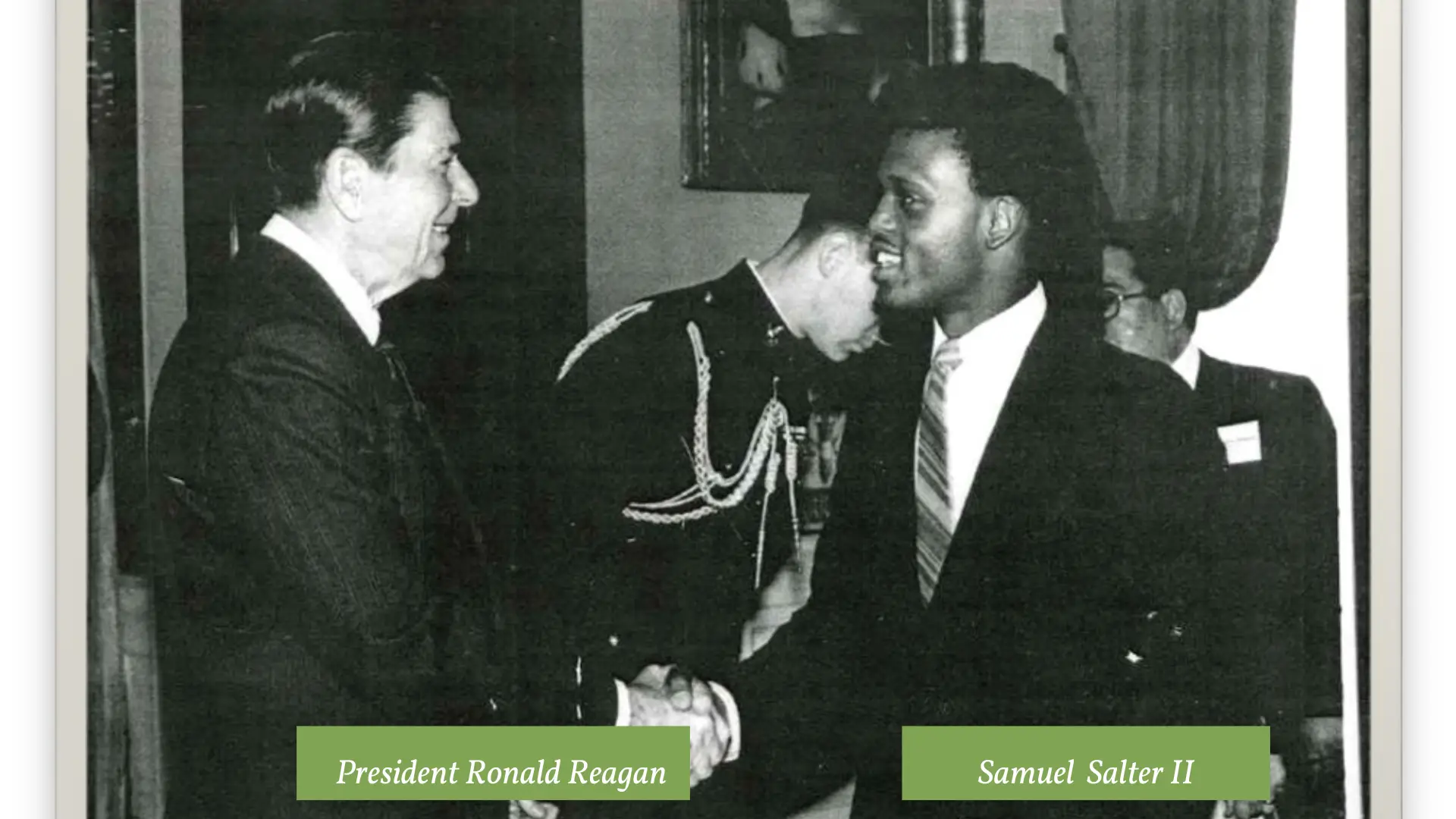 President Ronald Reagan shaking hands with Samuel Salter II